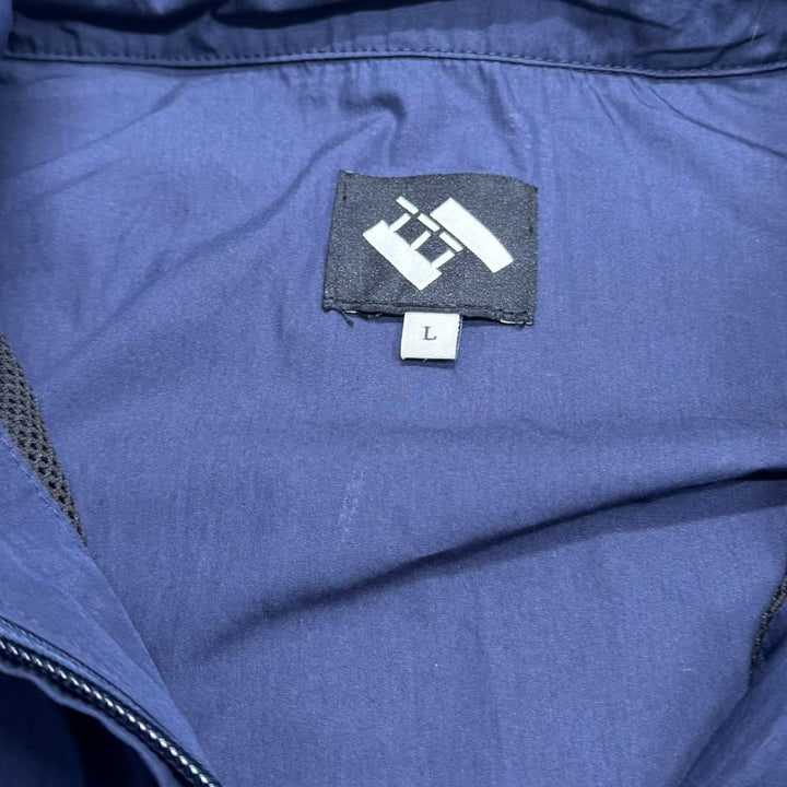 The Trilogy Tapes Packable Festival Jacket Navy Black (L)