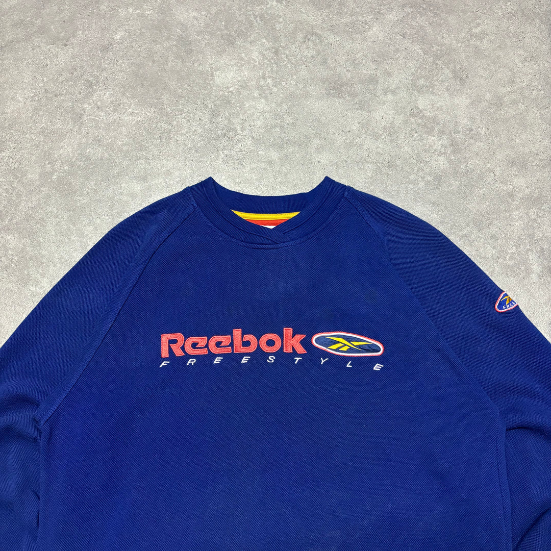 90's Vintage Reebok Blue Spell Out Sweatshirt (S)