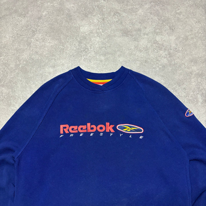 90's Vintage Reebok Blue Spell Out Sweatshirt (S)